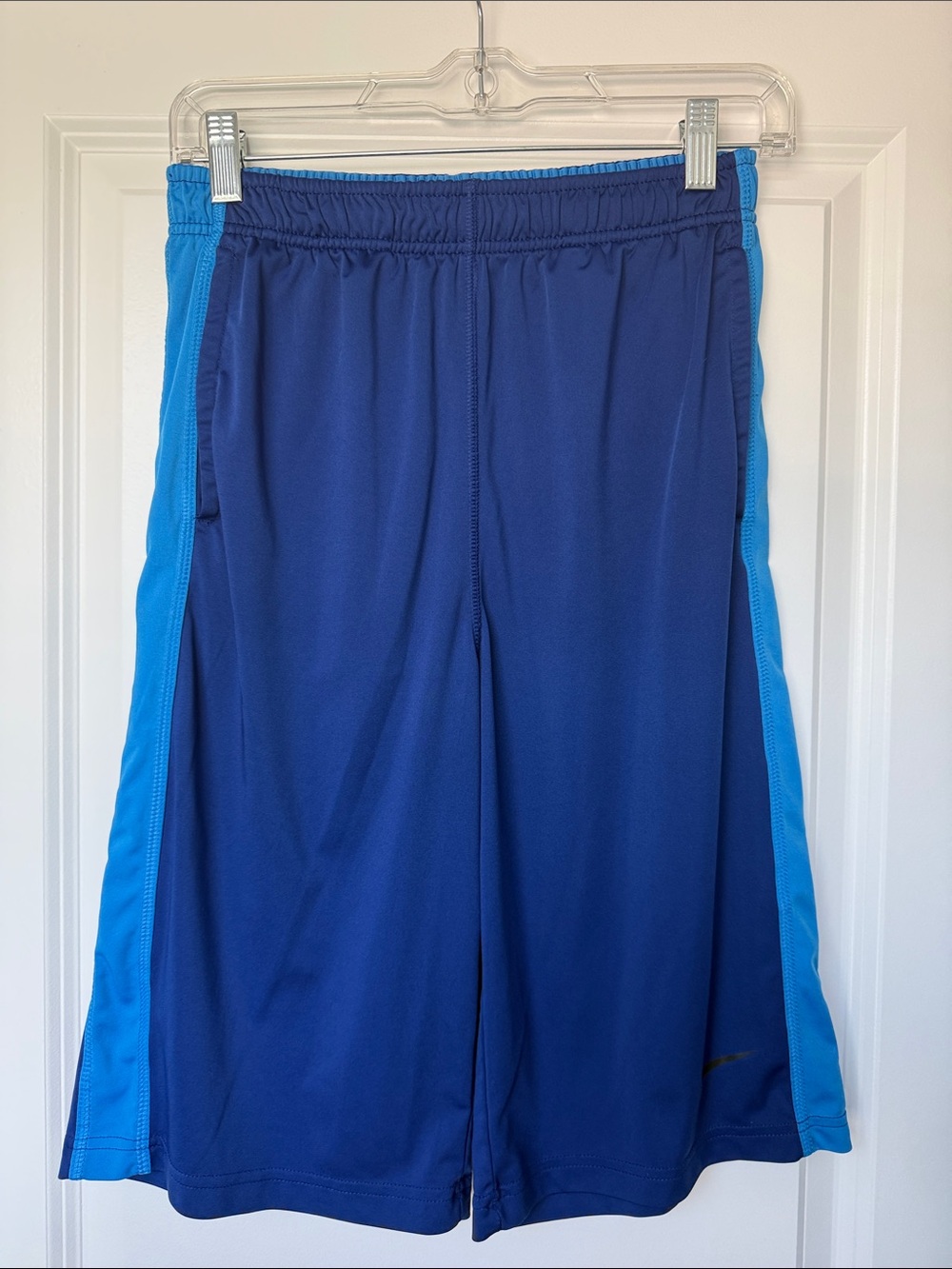 Nike Boys Blue Athletic Shorts with Light Blue Side Panels and pockets size XL